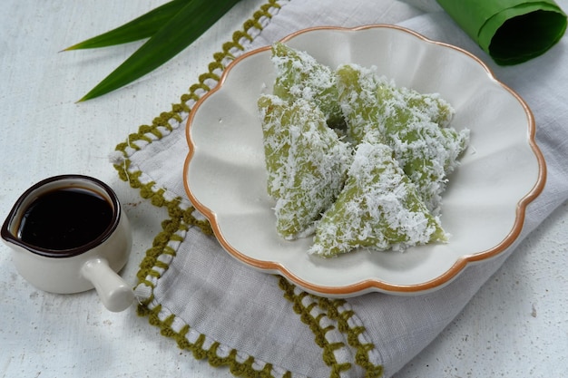 kue lupis Indonesian Traditional Snack Made From Sticky Rice, Wrapped with Banana Leaf,