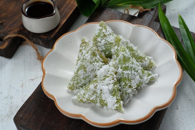 kue lupis Indonesian Traditional Snack Made From Sticky Rice, Wrapped with Banana Leaf,