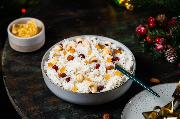 Kutia is a ceremonial grain dish Christmas sweet meal Boiled rice porridge traditional Slavic holiday ritual dish Sweet pilaf with nuts Kutya Ukrainian Orthodox christmas