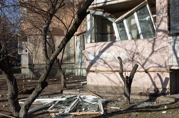 KYIV UKRAINE Mar 20 2022 War in Ukraine Residential building damaged by falling debris after Russian rocket attack on Kyiv