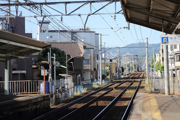 KYOTO - June 2 :railway station with people and town . JAPAN June 2 , 2016