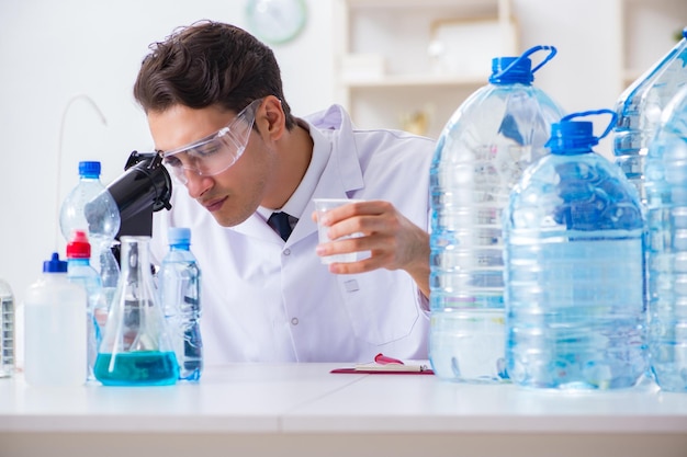 Lab assistant testing water quality