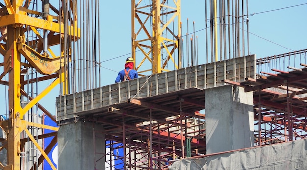 Labor or worker on building construction site and industial material and high angle view.