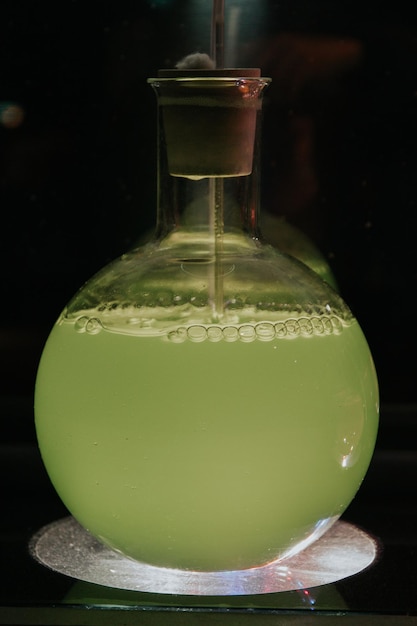 Laboratory flask isolated on black background