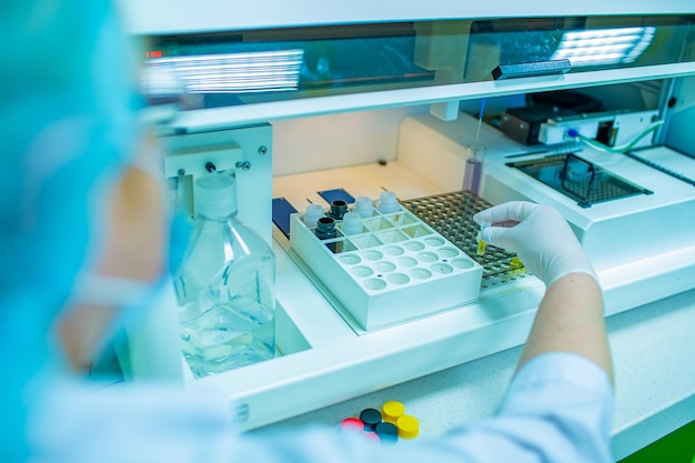 laboratory workers take analyzes and tests of drugs and patient samples Development of medical prep