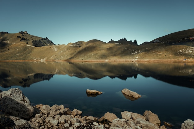 Lac De Lessy and Mountain landscape at sunrise in The Grand-Bornand, Haute-savoie, France