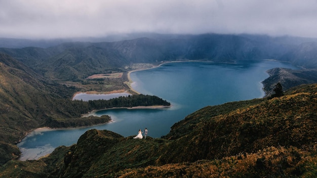 Lagoa do Fogo a volcanic lake in Sao Miguel Azores wedding couple