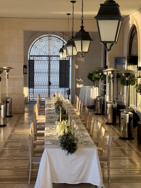 Laid festive table in the hall of an old villa