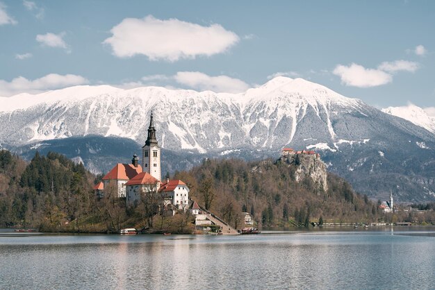 Lake Bled A Serene Escape with Saint Mary Church of Assumption on an Island Surrounded by Majestic Mountains and Valleys