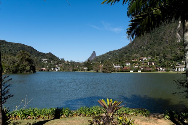 Lake Comary in Teresopolis Rio de Janeiro Brazil Mountain region of the state Place full of nature with houses and hills around Many geese and birds inhabit the region