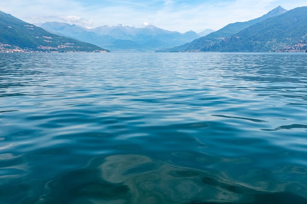 Lake Como (Italy) summer coast hazy view from ship board.