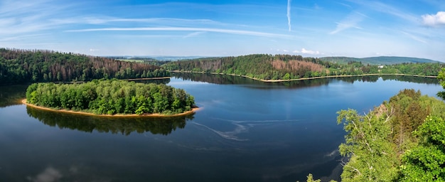 Lake and island with trees Water reservoir Sec Czech Republic Europe