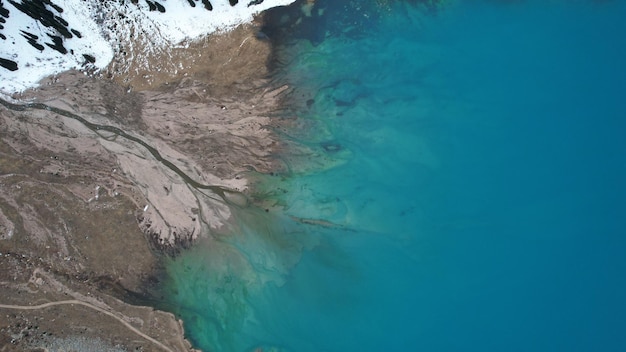 Lake in the mountains with turquoise blue water