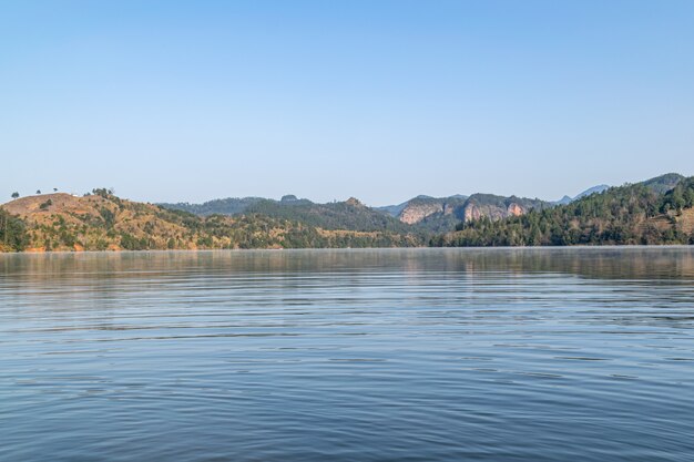 The lake reflects the mountains of Danxia landform