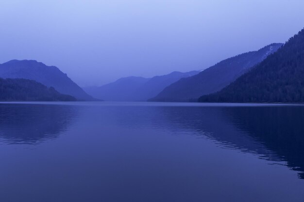 Lake Teletskoye Altai Republic Siberia Russia Blue clear sky and Mirror of lake Abstract