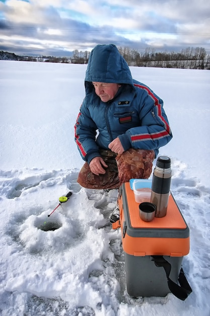 Lake Winter Fisherman