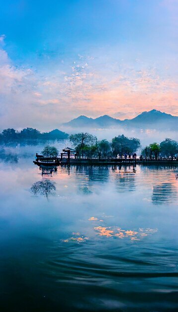 A lake with a mountain in the background