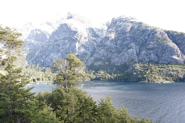 a lake with a mountain in the background