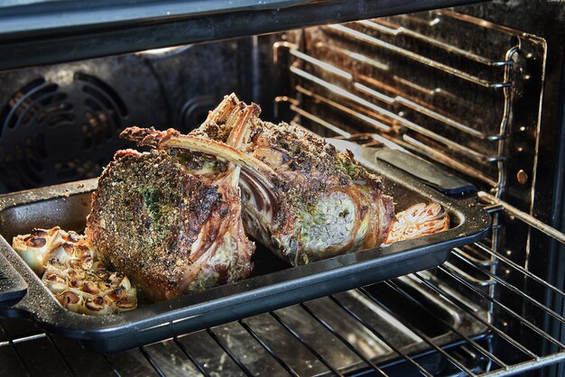 Lamb ribs with garlic and sauce baked in the oven