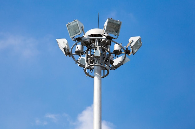 Lamp post electricity industry on blue sky background