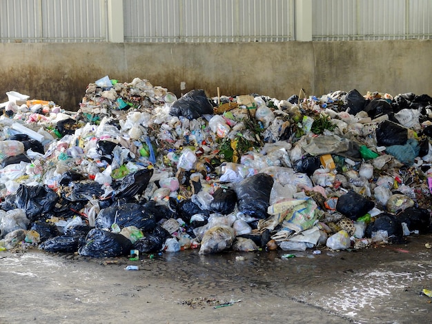 LAMPANGPROVINCE THAILANDDECEMBER 7 2016 Plastic and metallic waste from household in waste landfill Recyclable waste in dump site