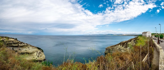 Landscape of the beach in a cloudy day of autumn