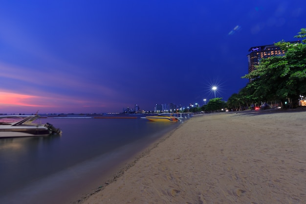 Landscape colors of the sky after sunset and beach lights Pattaya beautiful night