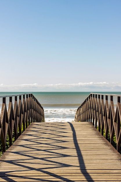 Landscape. Deck Bridge over the sand at the beach