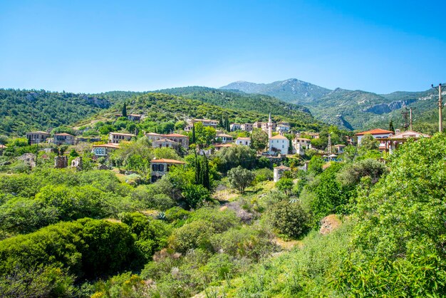 The landscape of Doganbay village and stone house on a summer and sunny day