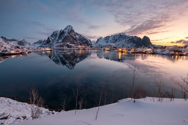 Landscape of fishing village with mountain reflection at Reine, Lofoten, Norway