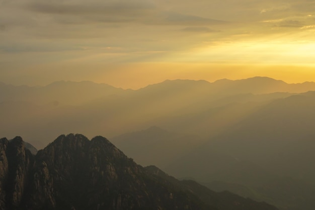 Landscape of Huangshan Yellow Mountain UNESCO World Heritage Site Located in Huangshan Anhui China tourist silhouette sunset