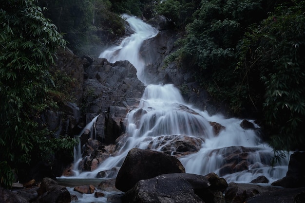 Landscape krating waterfall in the rainy season and refreshing greenery forest