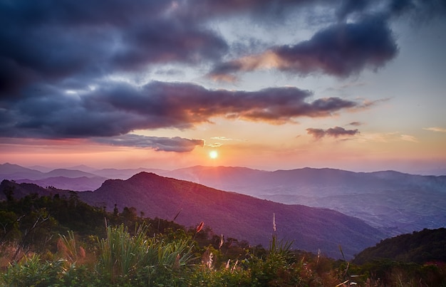 The landscape of mountains and the setting sun named Phu Chi Fa in Chiang Rai Province