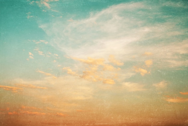 Landscape nature background of sunset with blue sky - vintage color tone and grunge overlay effect