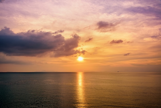 Landscape of orange sky sun and sea during sunset at the coast of Koh Samui island Thailand