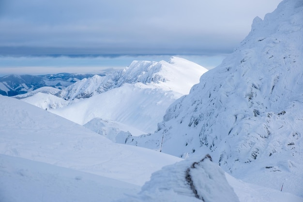 Landscape panoramic view of snowed winter tatra mountains