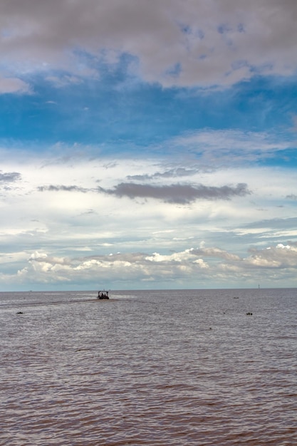 Landscape scene from floating village Tonle Sap lake Cambodia