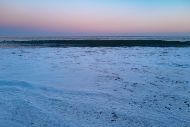 Landscape of sea and tropical beach at sunset or sunrise time for leisure travel and vacation reflec