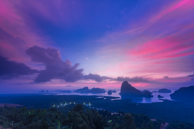 Landscape of sunrise at   limestone karsts in Phang-nga bay at sunrise. Unseen place of 