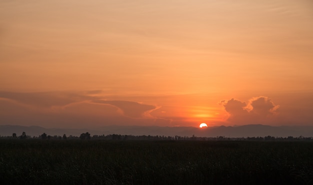 Landscape of sunset over misty mountains in the evening, National park of Thailand