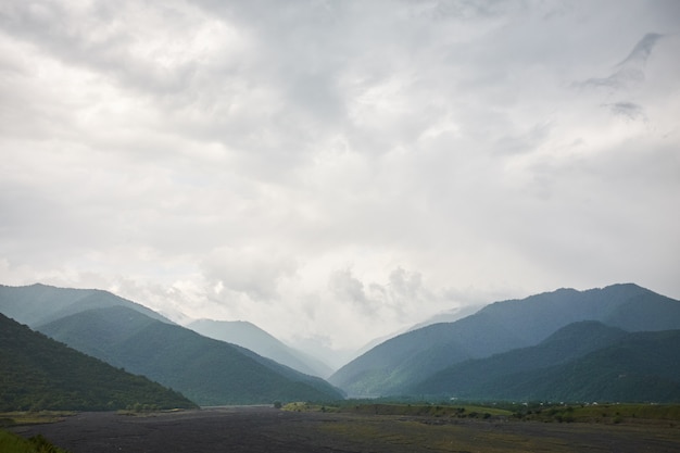 Landscape of a valley of a mountain valley, mountains background mountain river, Georgia, Caucasus