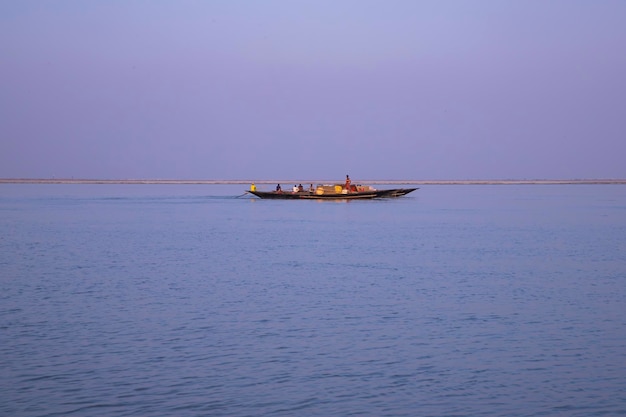 Landscape View of a fishing boat on the Padma river in Bangladesh