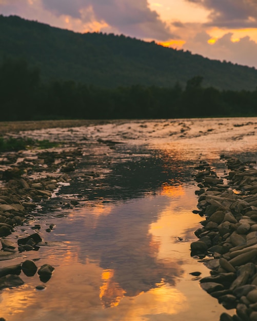 Landscape view of sunset over mountain river outdoors