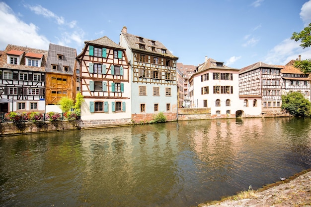 Landscape view on the water channel with beautiful half-timbered houses in Strasbourg city, France