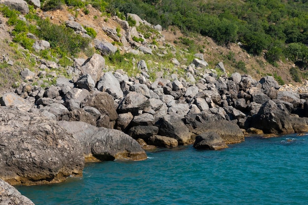 Landscape wild sea beach with large gray stones on the Black Sea