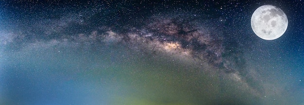 Photo landscape with milky way galaxy and the full moon. (elements of this moon image furnished 