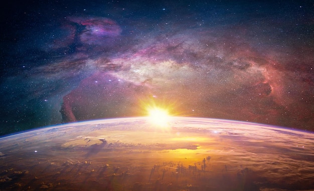 Landscape with Milky way galaxy Sunrise and Earth view from space with Milky way galaxy Elements of this image furnished by NASA