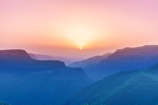 Landscape with mountains and sky in sunset