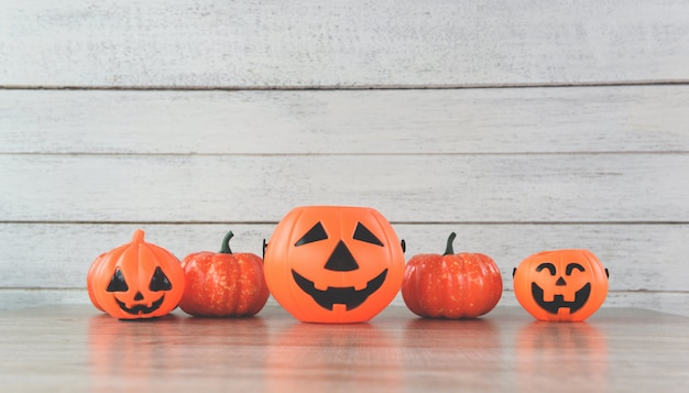 lantern pumpkin halloween decorations on white wood