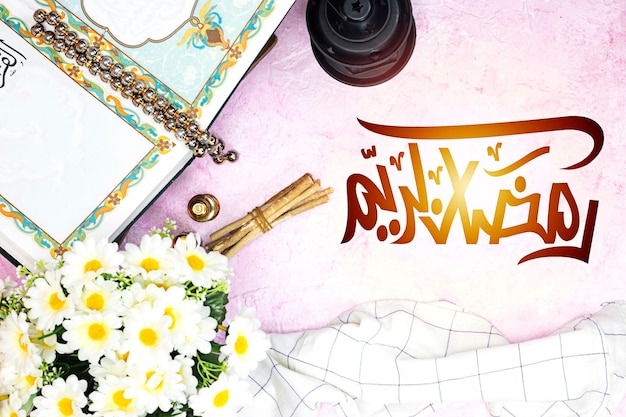 lantern and rosary muslim and holy book with arabic calligraphy mean quran adn daisy flowers islam